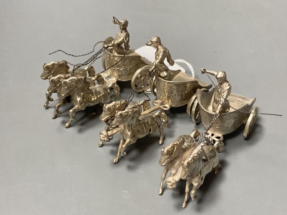 A matched set of three modern silver models of chariots with rider and horses, maker SMD, London, 1965/6, length 9cm, 8.5oz.